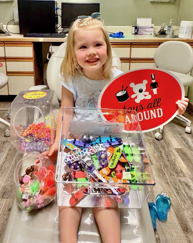 A dentist at Alan B. Evans, DDS, PC using tools on a patients mouth in in Muscatine, IA